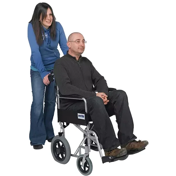 Someone pushed in an assistant propelled wheelchair