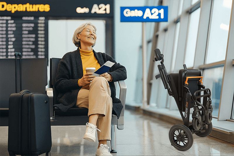 A lady sitting in the airport with her Whizzi Lite
